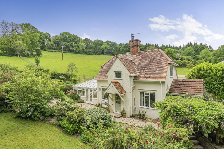 Click the photo for more details of Holyford Cottage, Colyford