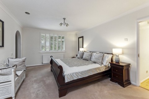 Click the photo for more details of Woodpecker Close, Cobham, KT11