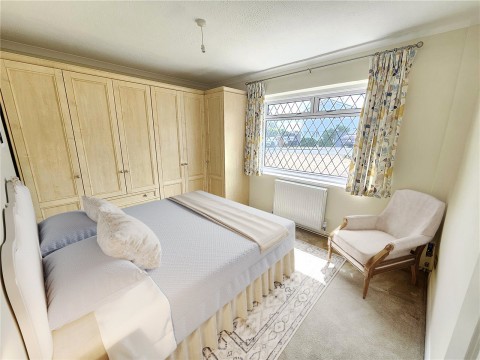 Click the photo for more details of Malus Drive, Row Town, Surrey