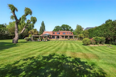 Click the photo for more details of Stokesheath Road, Oxshott, KT22